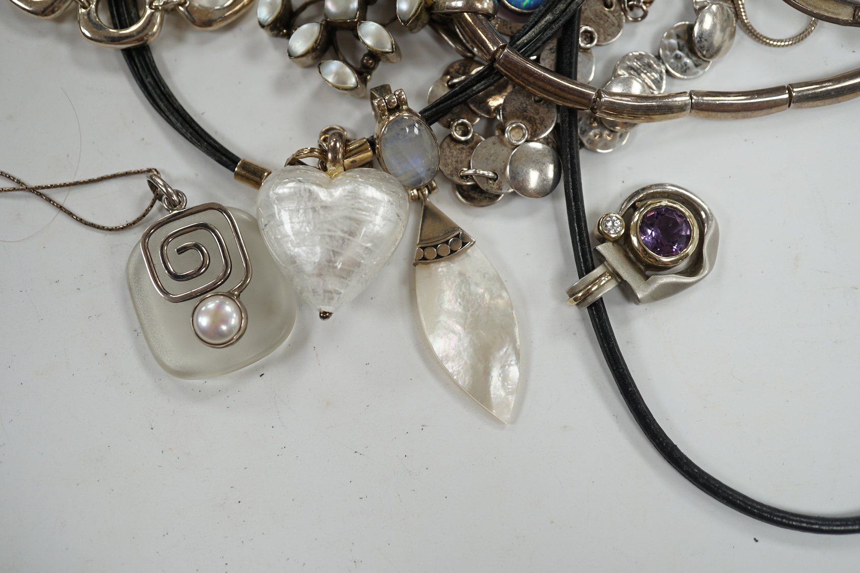 A small group of assorted modern 925 and white metal jewellery including necklaces, bracelet etc. Condition - fair